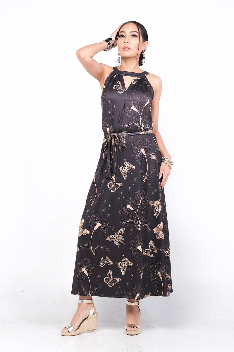 Robe Vanilya en polyester et spandex, de couleur noire avec un motif délicat de papillons et fleurs. Elle offre un ajustement parfait pour toutes les silhouettes. Elle est parfaite pour le printemps et l'été.