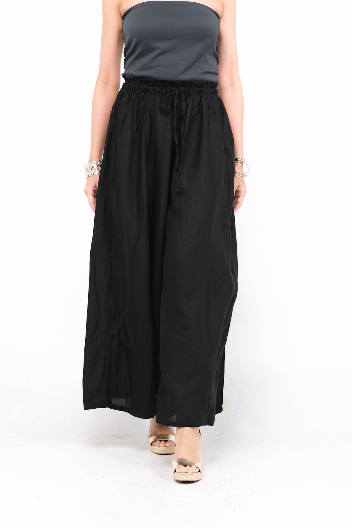 Rayonne. Pantalon Palazzo Mistral, ample et fluide, idéal pour les jours chauds.