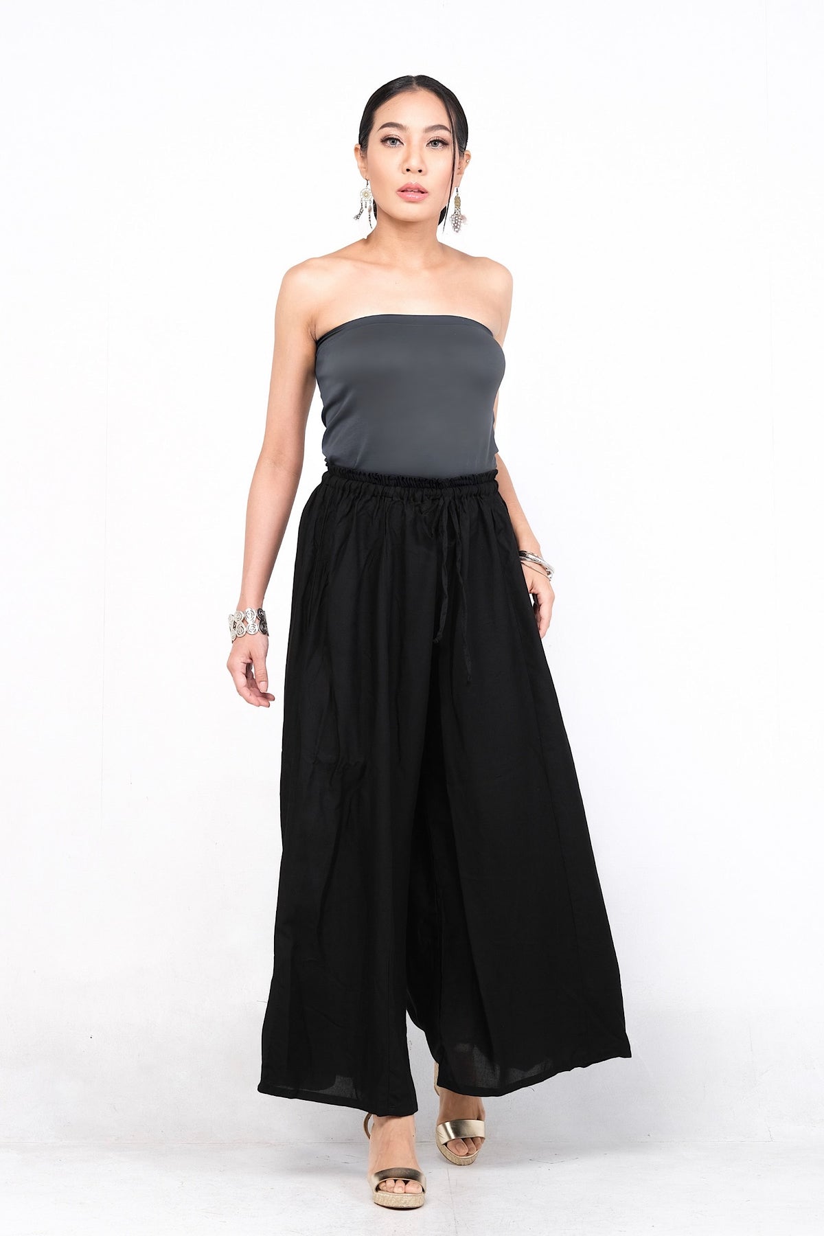 Rayonne. Pantalon Palazzo Mistral, ample et fluide, idéal pour les jours chauds.