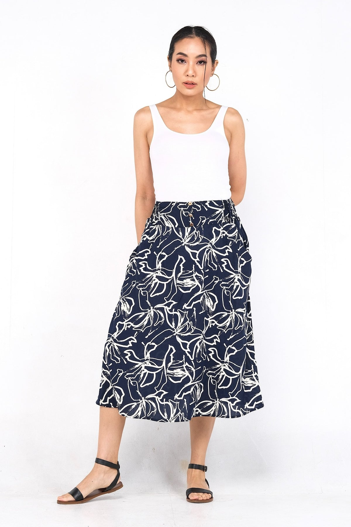 Jupe ample en viscose légère, parfaite pour le confort estival avec sa taille élastique et ses poches pratiques.